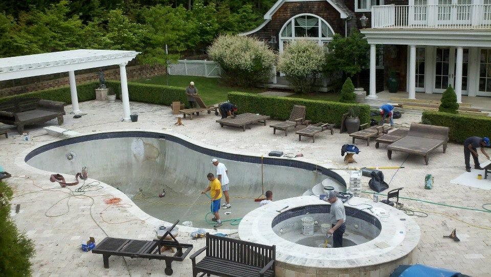 Pool construction crew working on a large pool