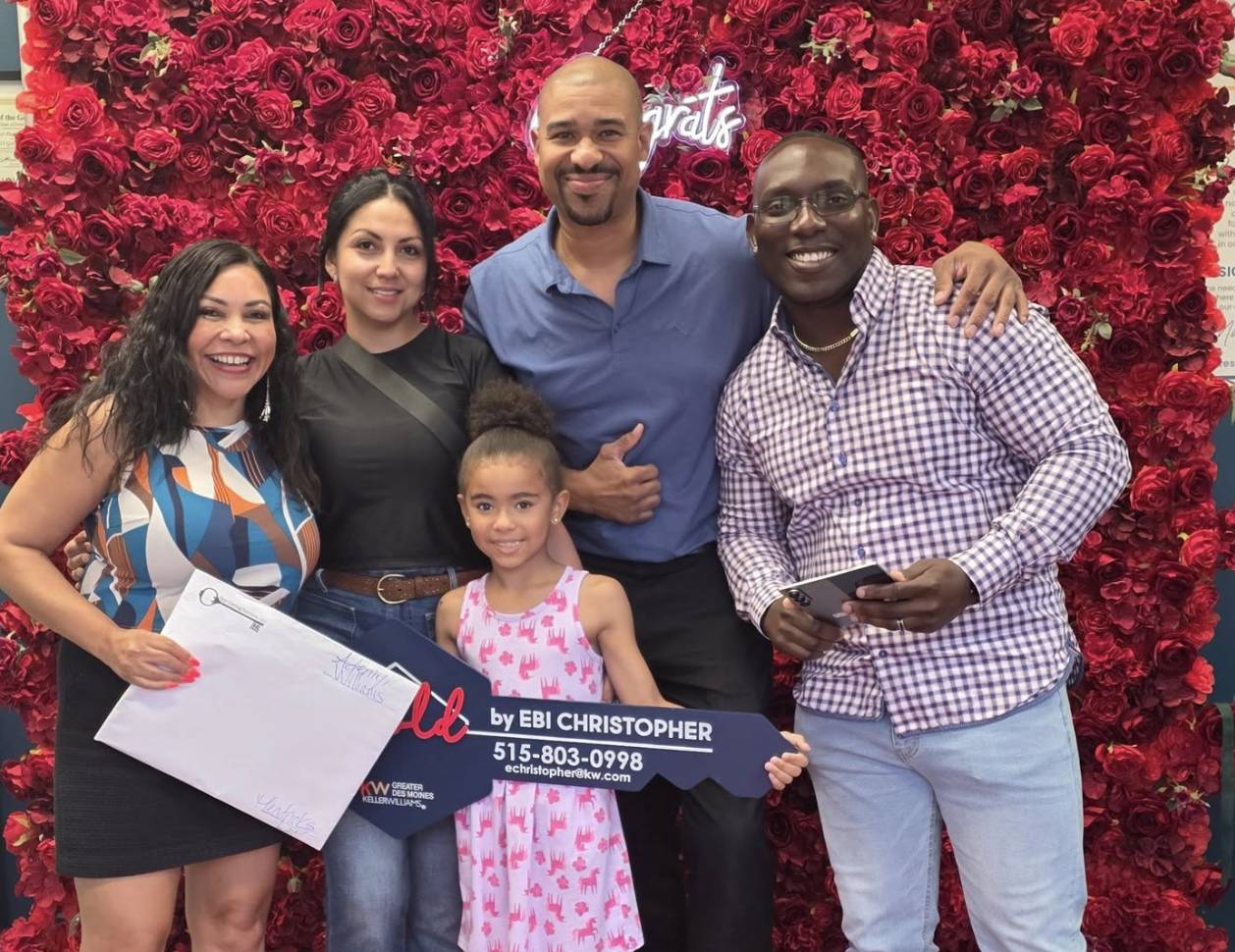 Marlen Maddux with happy first-time home buyers