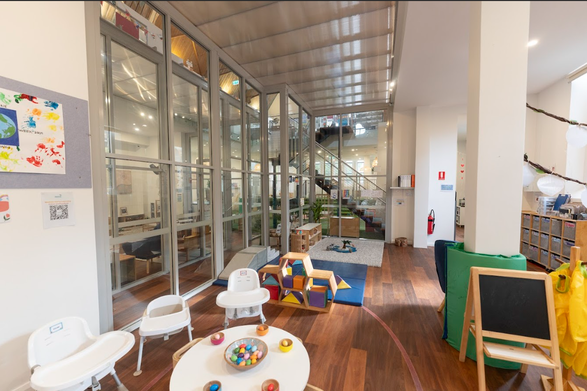 WeKidz nursery room with glass atrium and play area