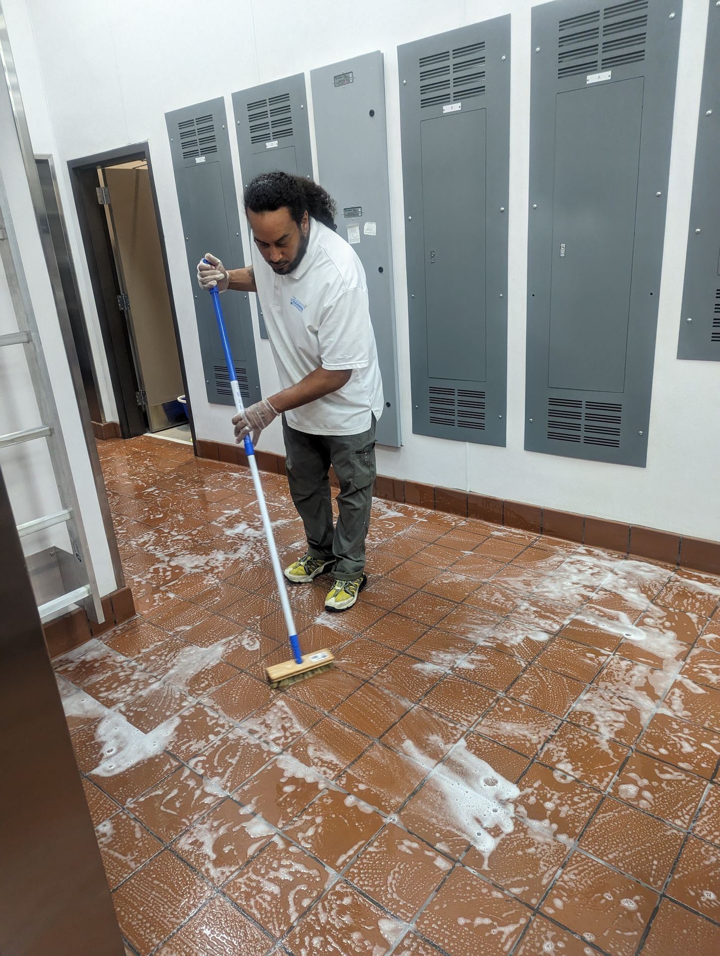 Delannoys cleaning professional scrubbing floors in Albany NY