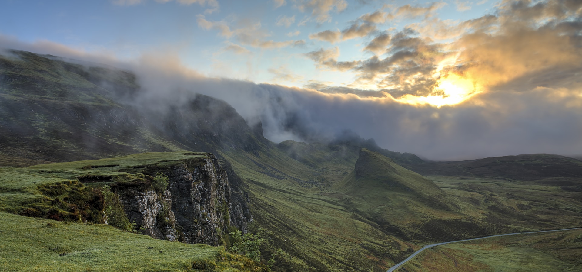 Dramatic mountain skyscape at golden hour