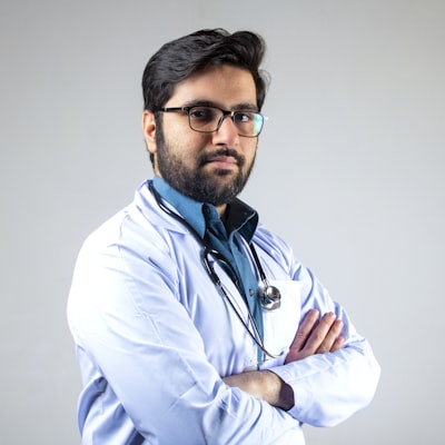 Professional portrait of Dr. Michael Chen, Attending Physician