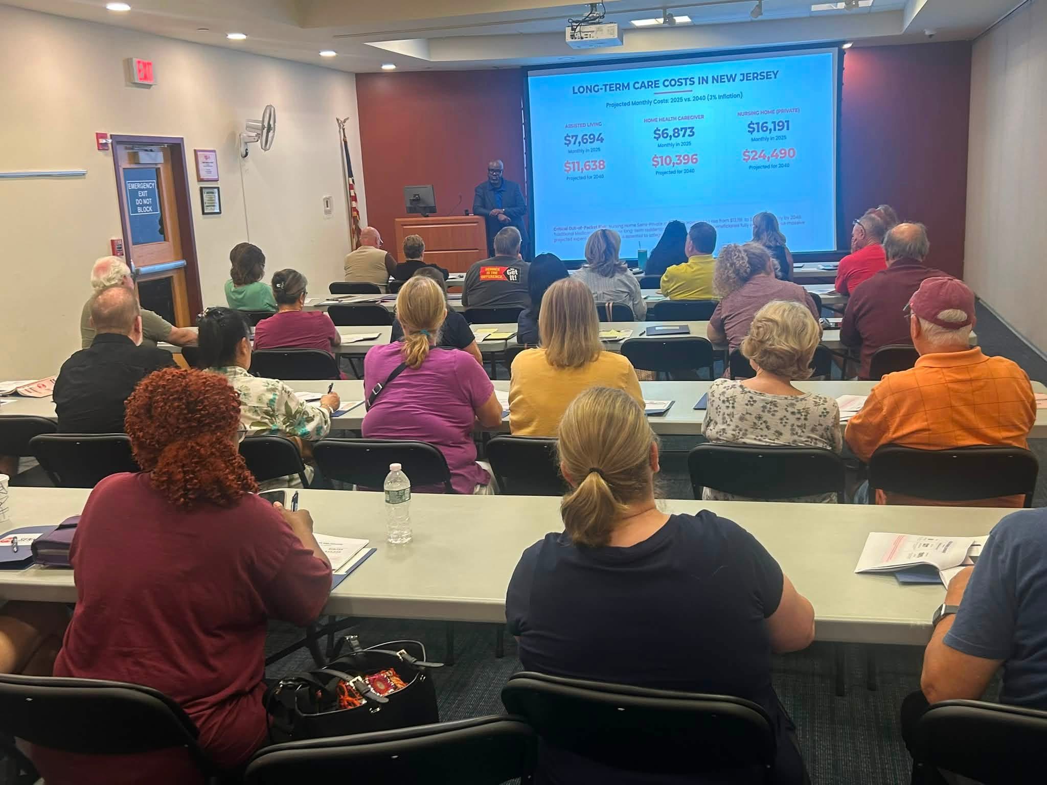 Francois Loudonou presenting at an in-person Medicare & Long-Term Care educational workshop