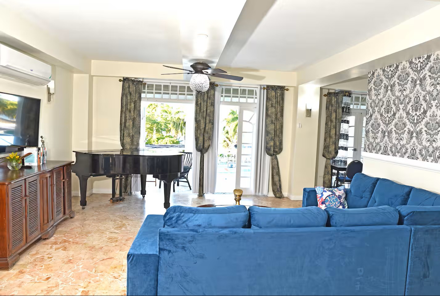 Sunlit Salon with Grand Piano & Scenic Pool/Garden Views