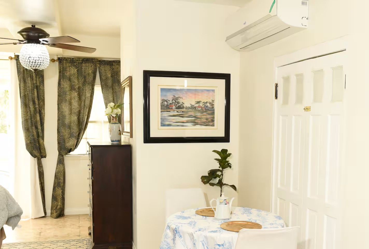 Cozy Dining Nook & Dresser with AC and Crystal Ceiling Fan