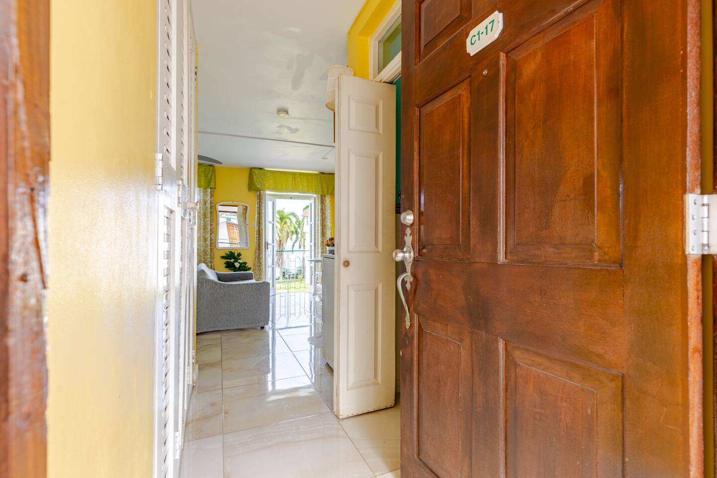 Suite Entrance C1-17 with View into the Bright Living Area