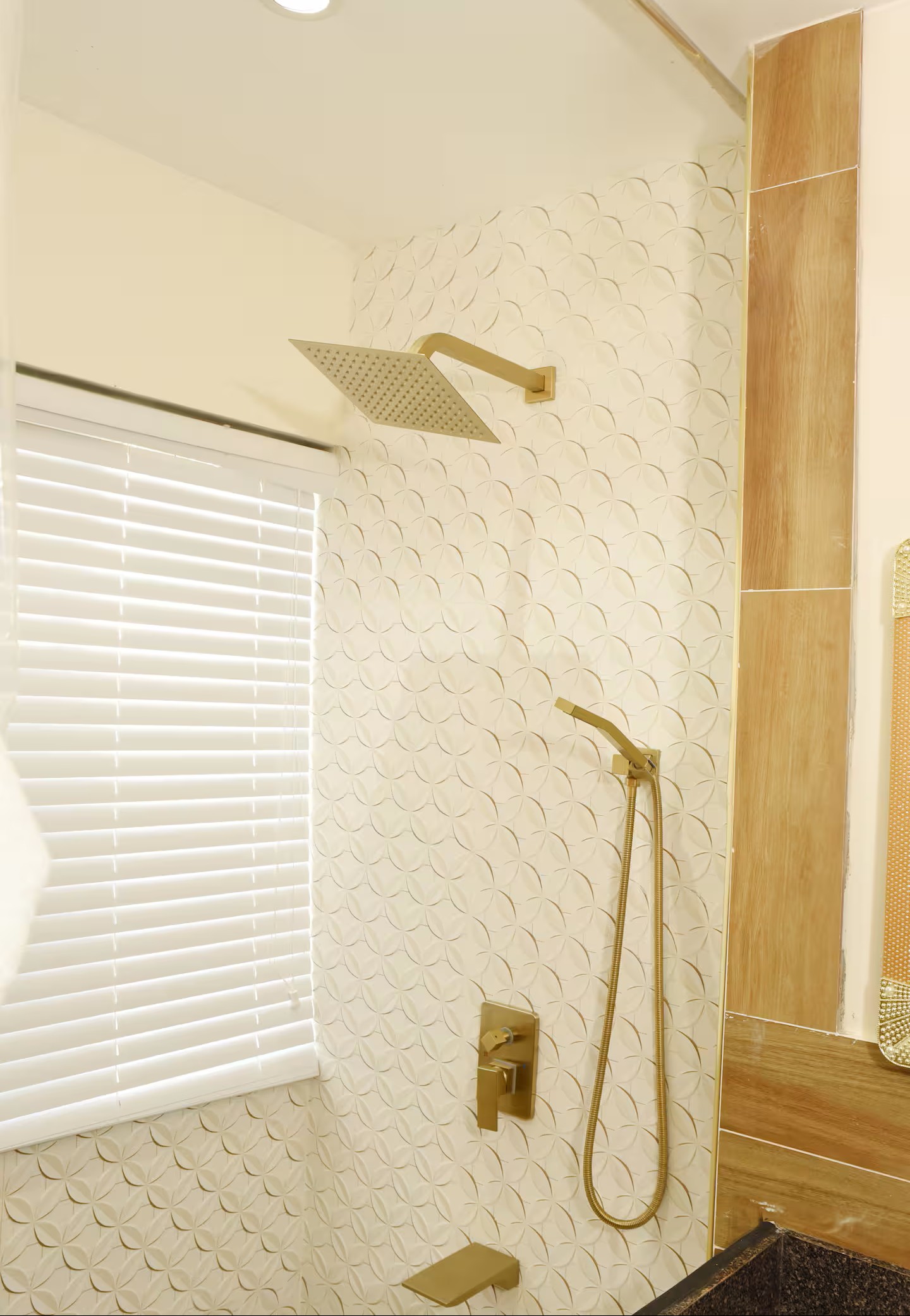 Modern Spa Bathroom with Brushed Gold Rainfall Shower Fixtures