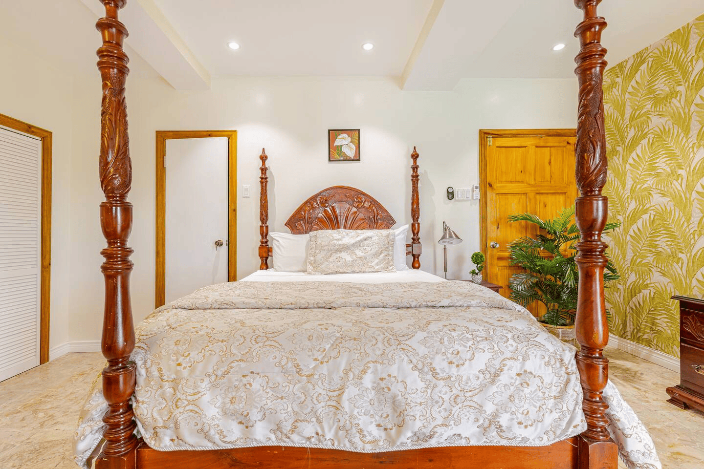 Locally Hand-Carved Four-Poster Bed & Tropical Decor