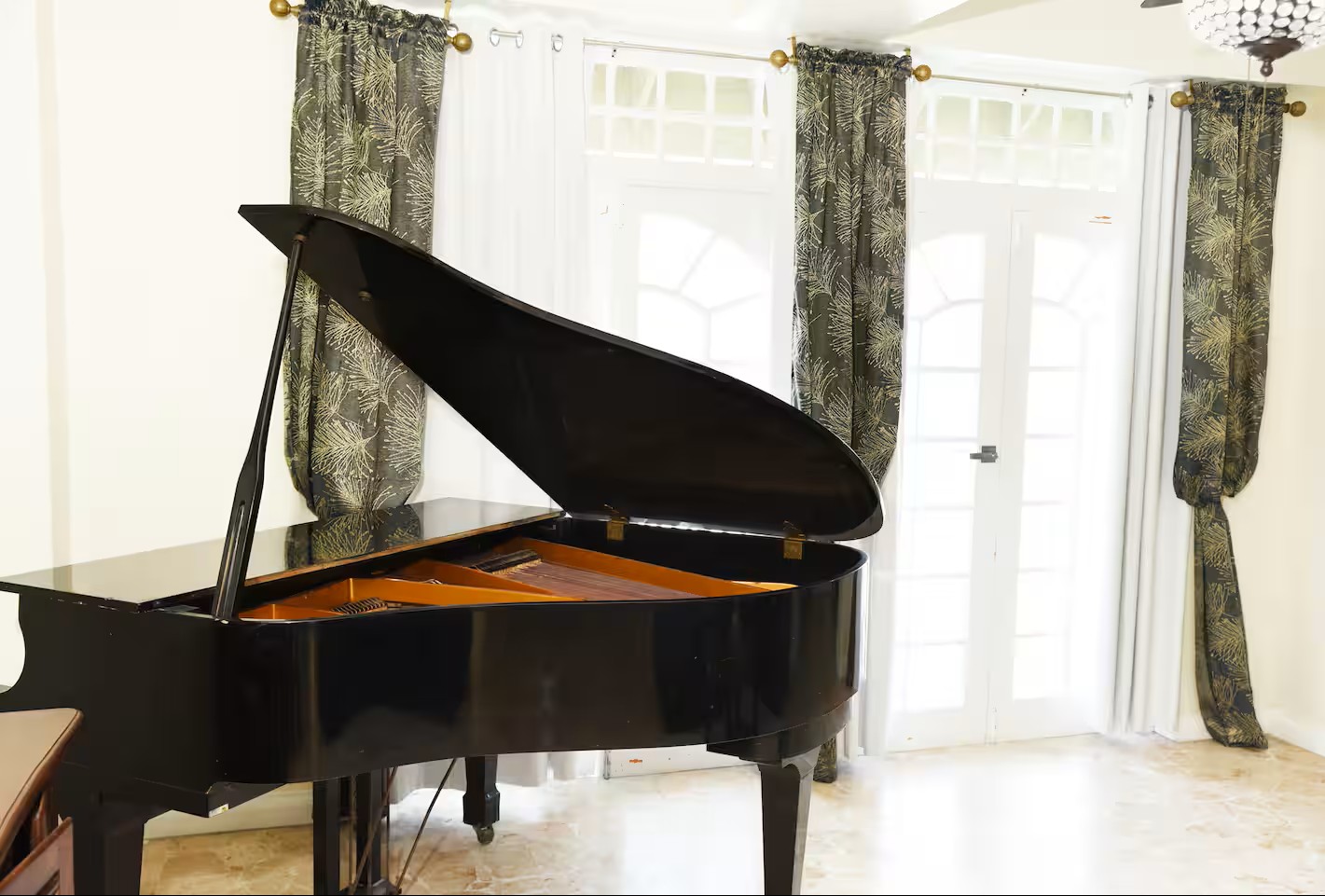 Elegant Baby Grand Piano by Sunlit Garden French Doors