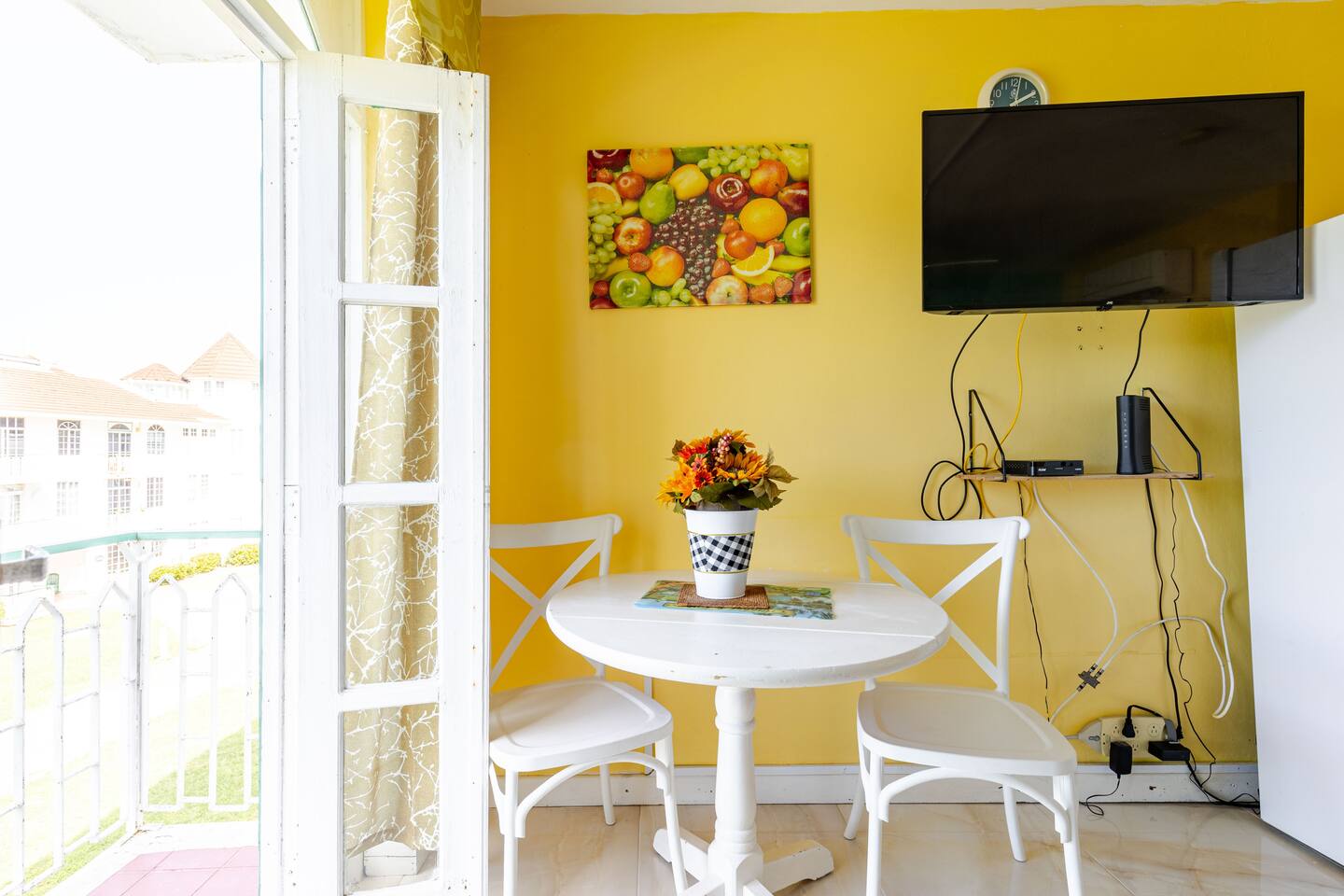 Bistro Dining Table by the French Balcony Doors & Smart TV
