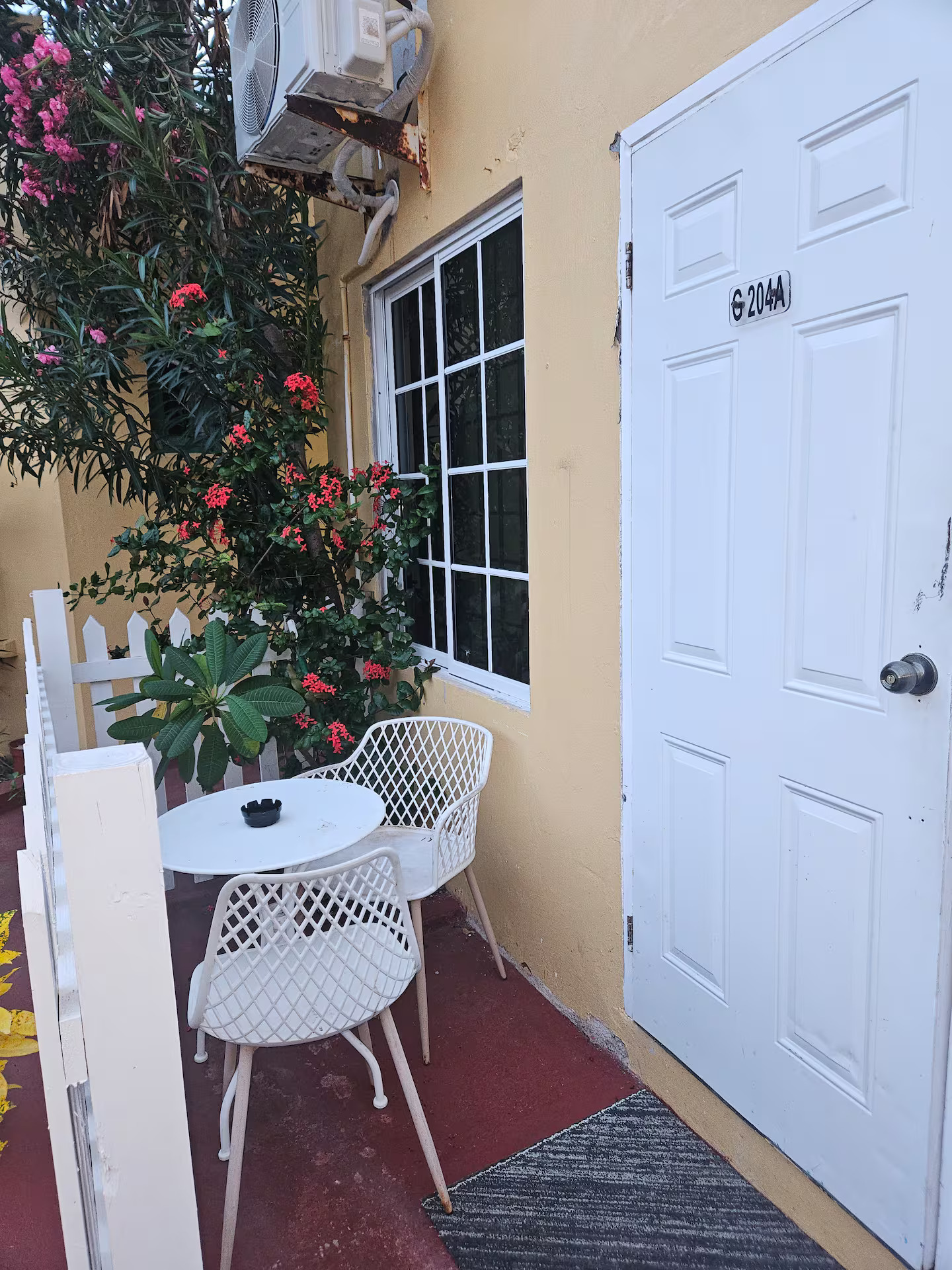 Shaded Private Patio Bistro Table Outside Suite 204A