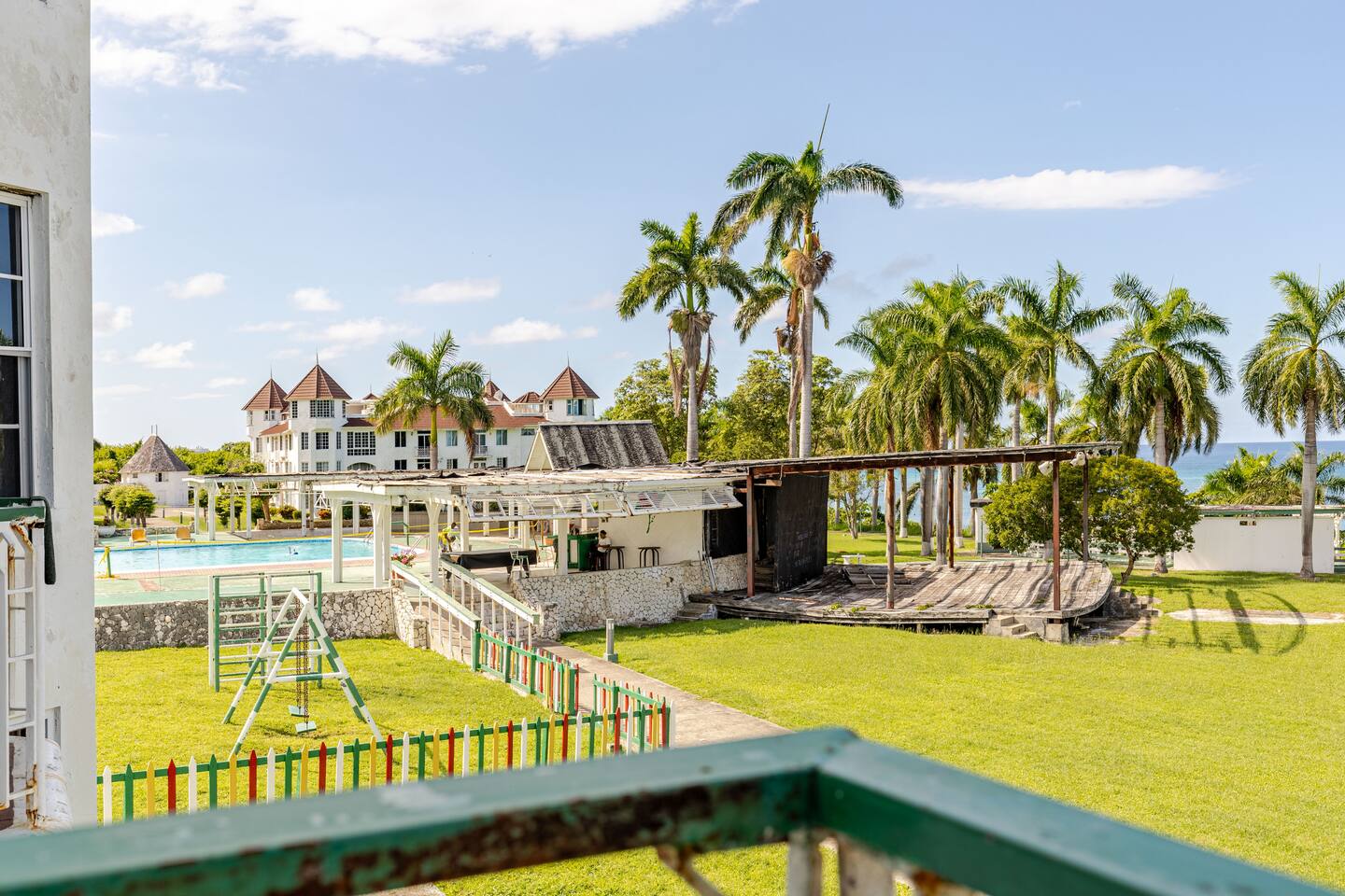 Private Balcony View of the Tropical Lawns, Pool & Caribbean Sea
