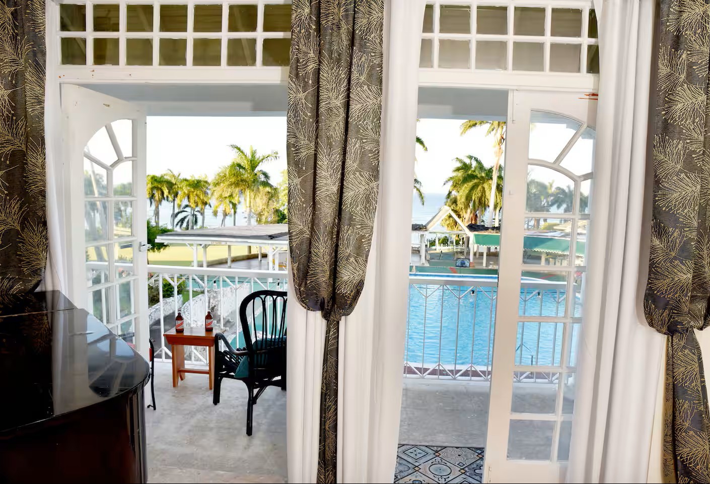French Balcony Doors Overlooking the Swimming Pool & Ocean View