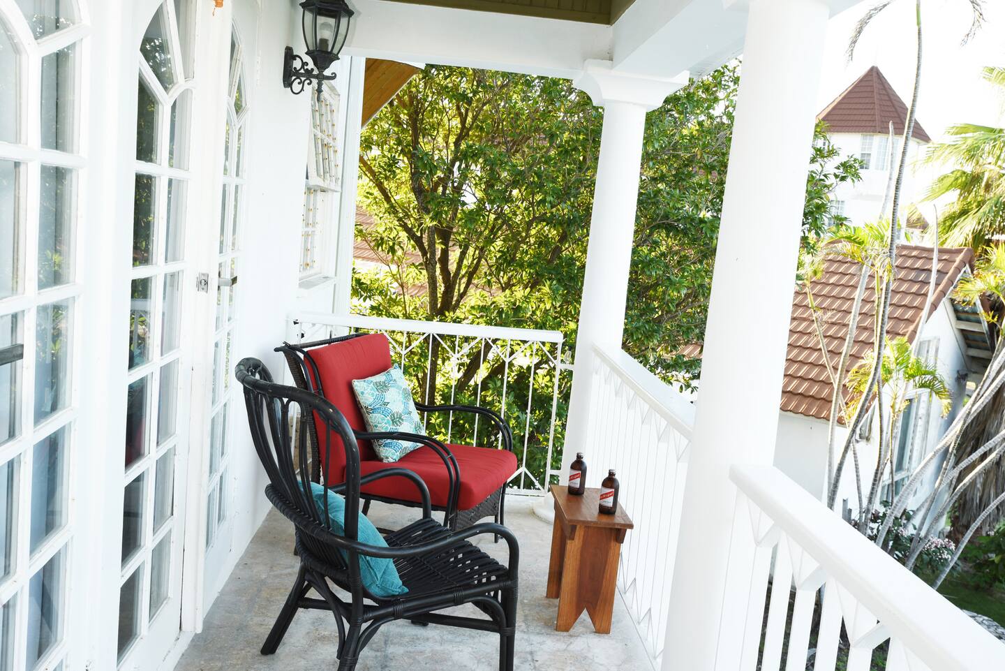 Private Covered Veranda with Wicker Seating & Estate Views