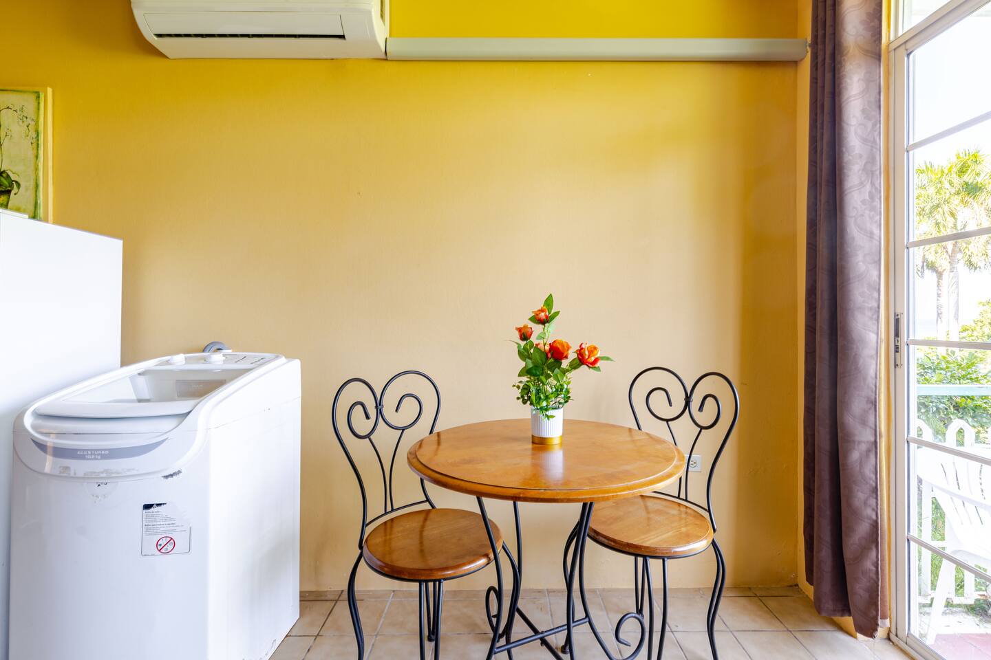 Dining Bistro Table & Balcony Access with Natural Light
