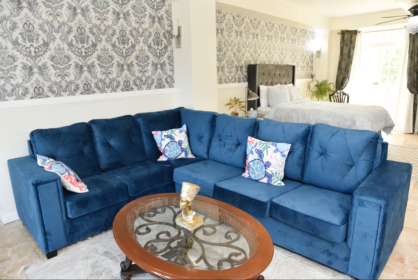 Plush Velvet Sectional Lounge Area Leading to the Master Bedroom Suite