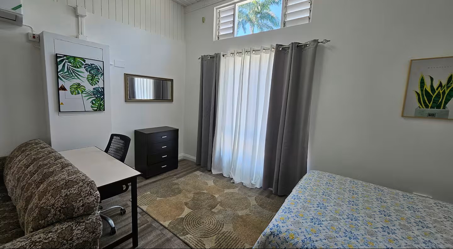 Dedicated Workspace Desk with Office Chair & Garden View Window