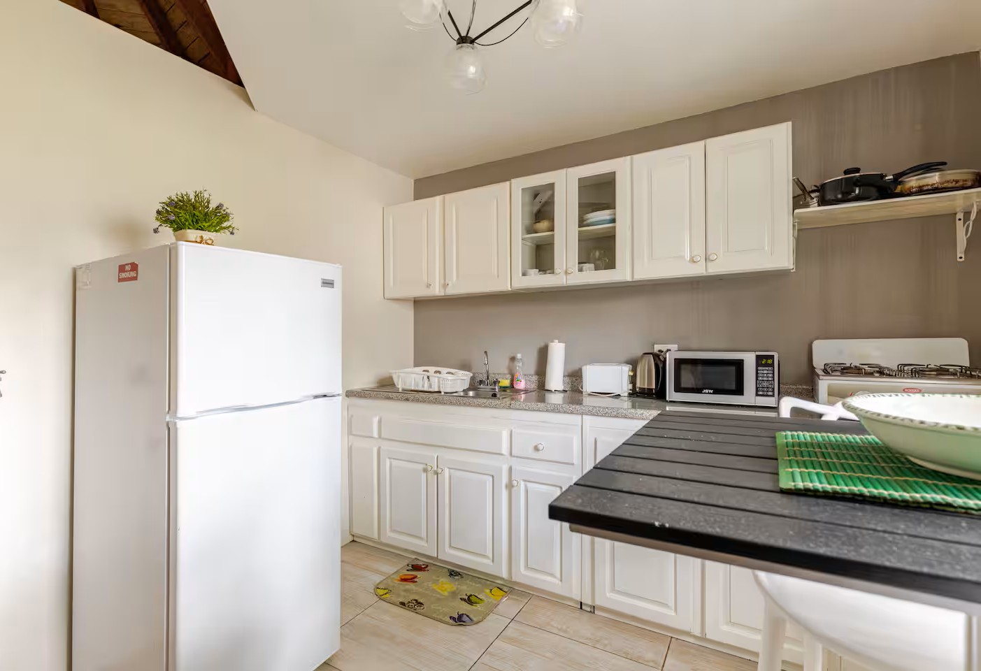 Kitchenette with Full Refrigerator, Dining Bar & Cookware