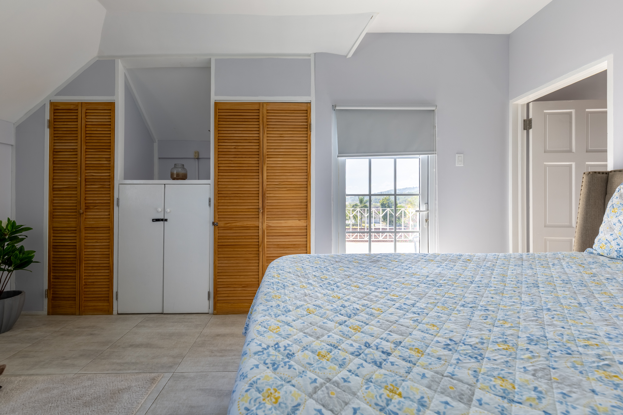 Lux Penthouse 207 - Master Bedroom with Custom Louvered Closets & Mountain Scenic Window