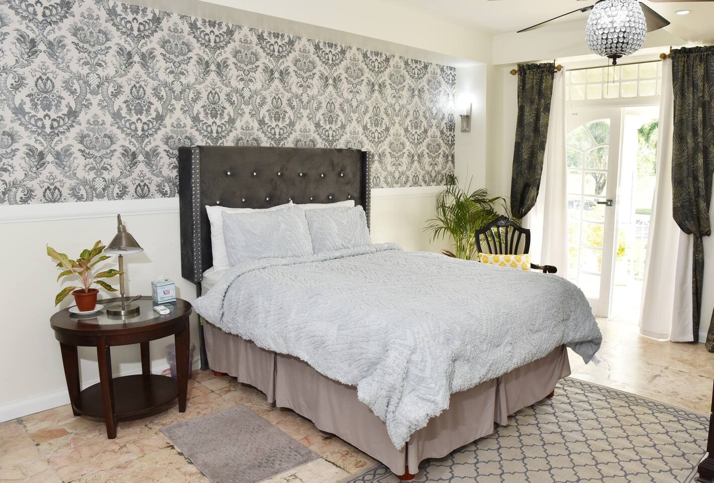 Master Bedroom with Tufted Headboard, Crystal Chandelier & Garden Terrace Access