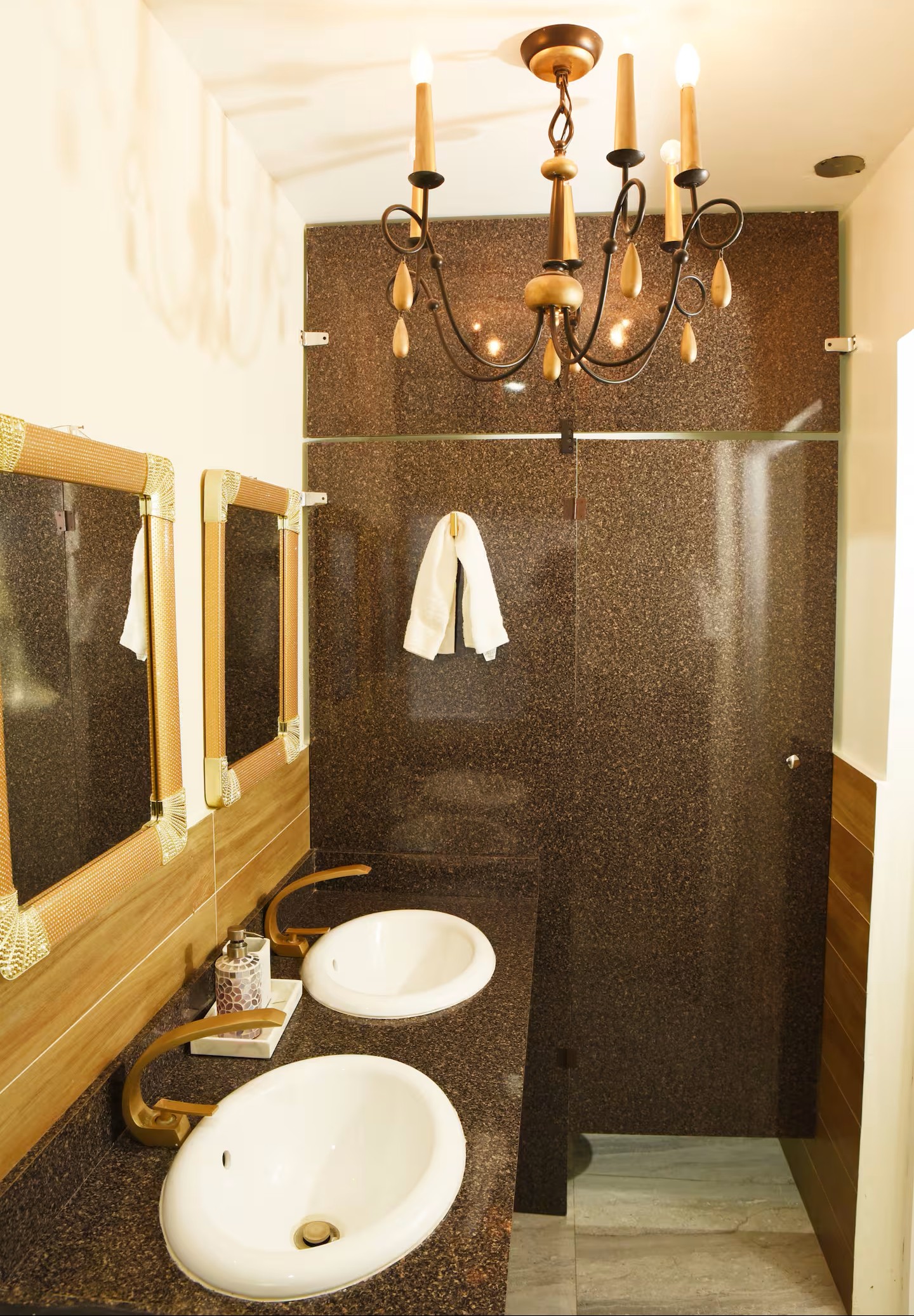 Spa-Inspired Master Bathroom with Marble Countertop & Chandelier Lighting