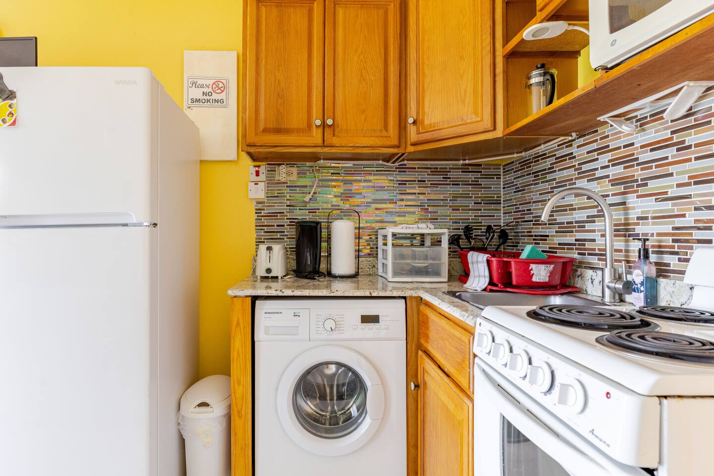 Kitchenette Countertop, Cooktop, Sink, Microwave & Washing Machine