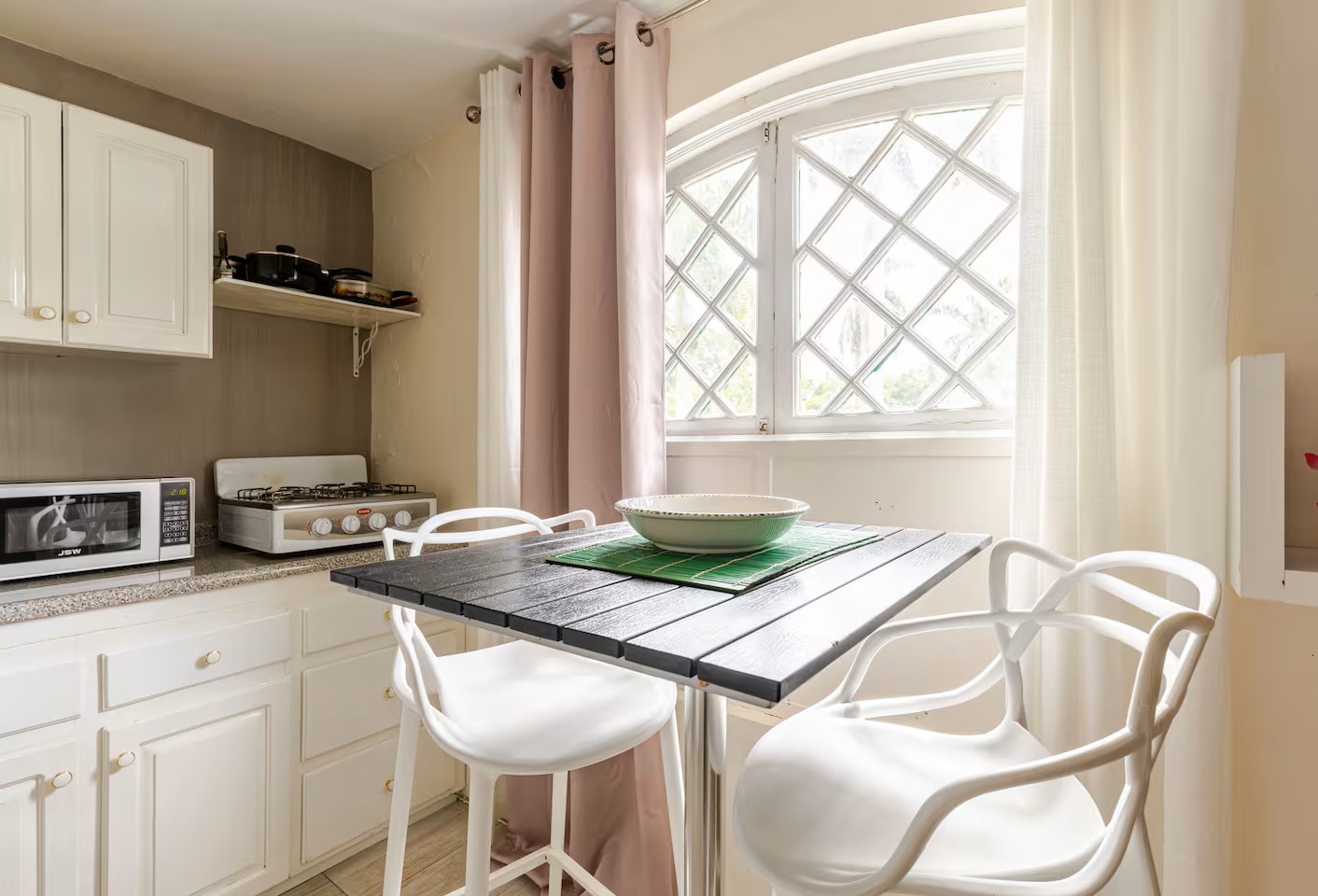 Breakfast Dining Nook with High-Top Seating & Arched Window