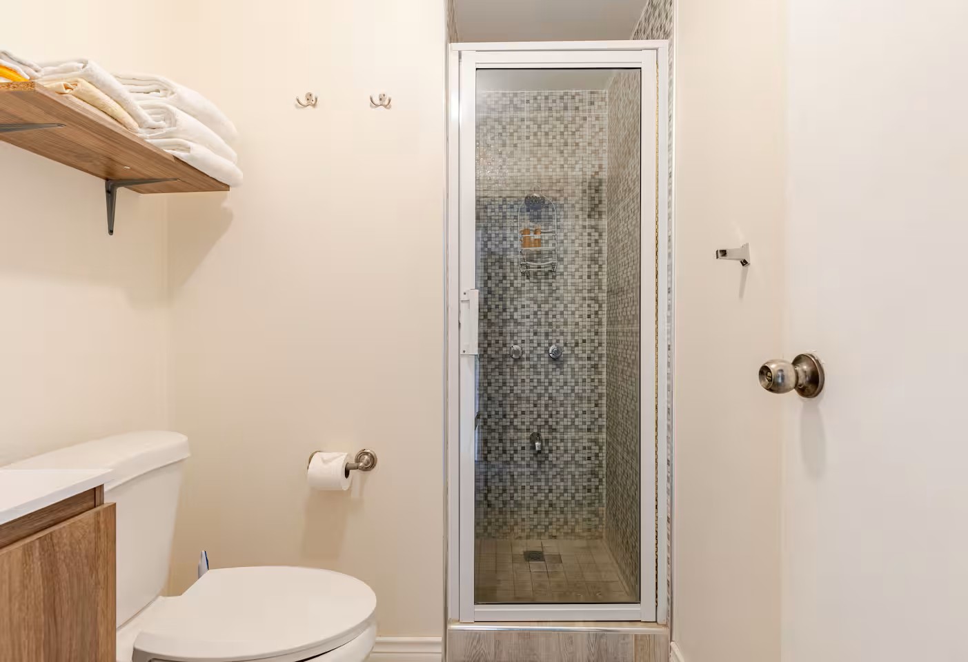 Bathroom with Walk-In Shower, Fresh Towels & Clean Fixtures