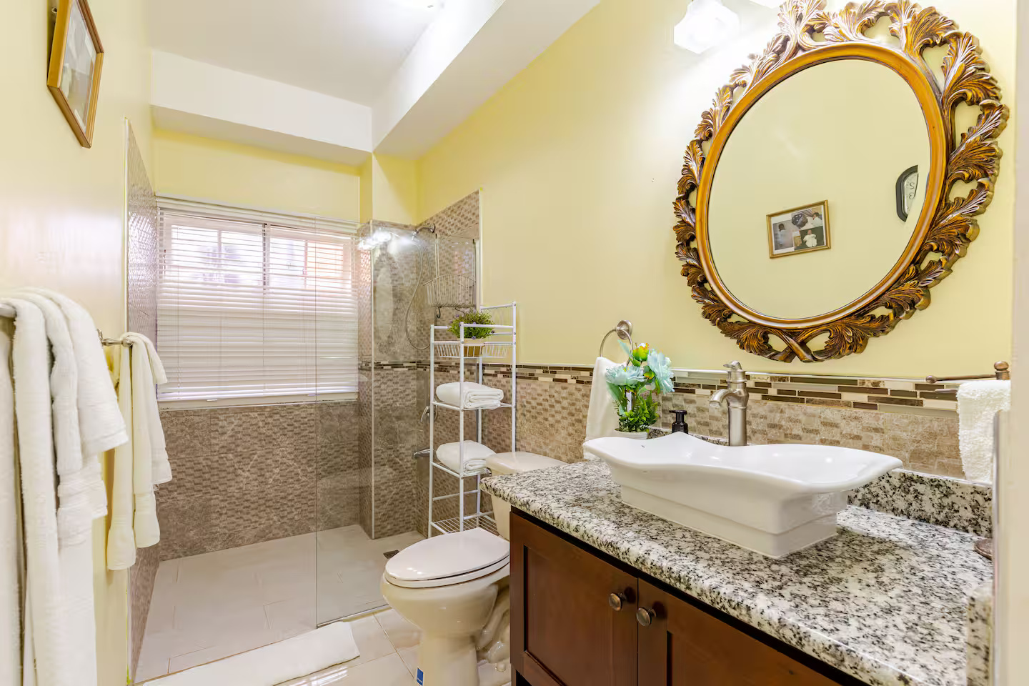 Luxury Vanity with Granite Countertops, Designer Vessel Sink & Ornate Gilded Mirror