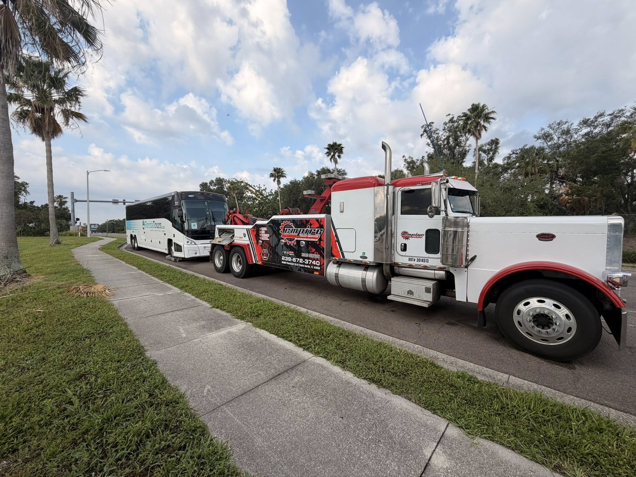 Empire Road Service towing a bus