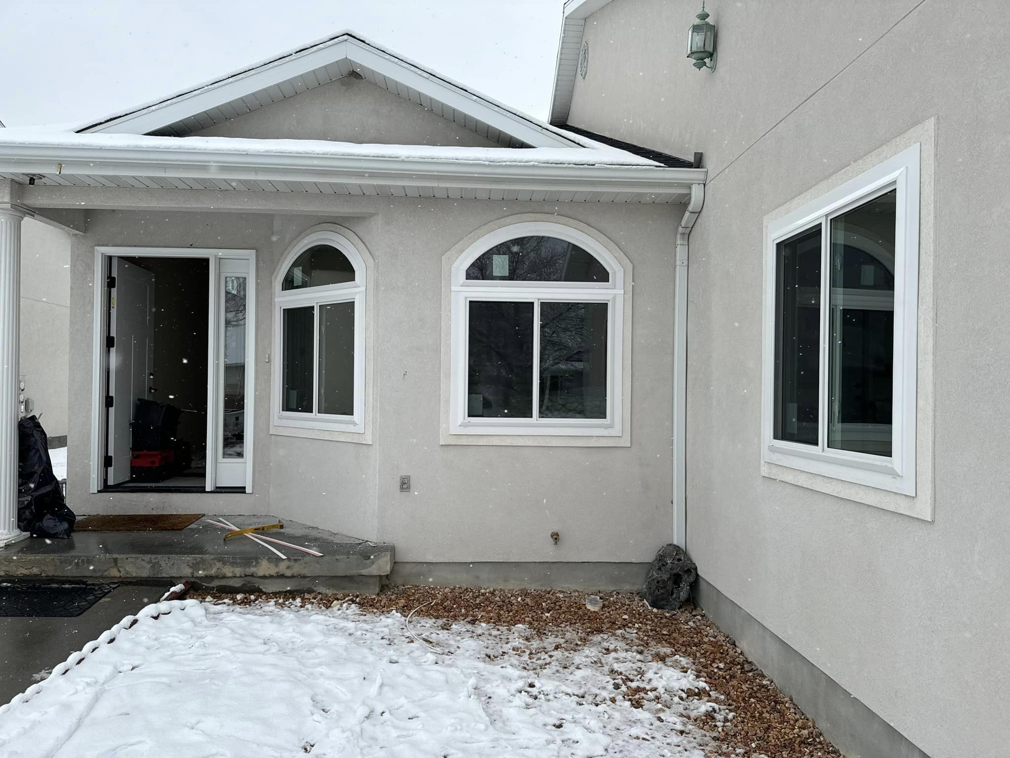 White home with new arched windows