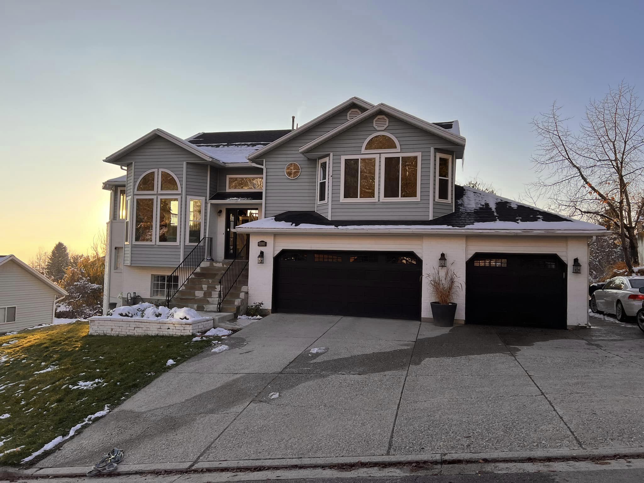 Light grey home with arched windows