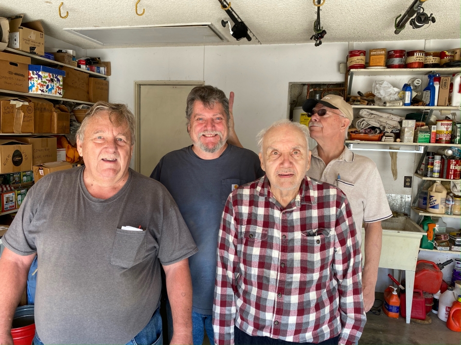 Vic Goodman, Jon Johnson, Joe Hrkel, and Bob Martin during the 2020 Kit Cutters ownership transfer in Huntington Beach, California.