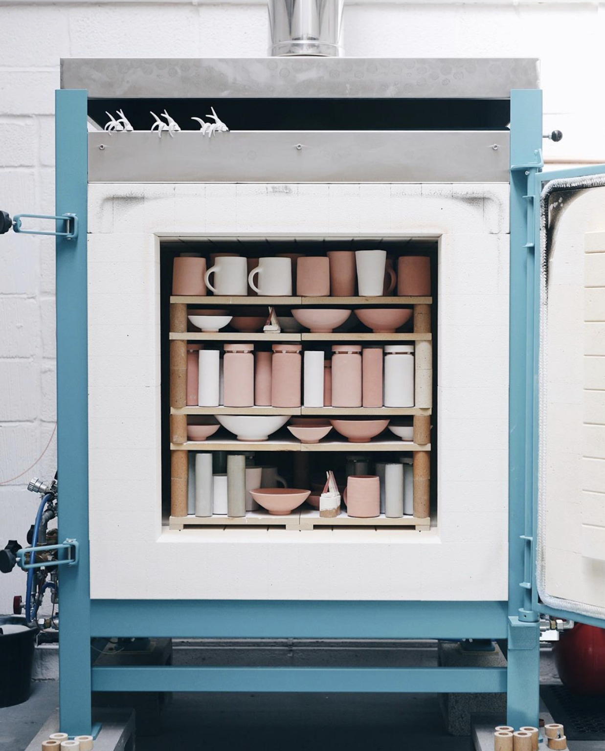 Ceramic kiln loaded with pottery ready for firing — Clay RX kiln maintenance Los Angeles