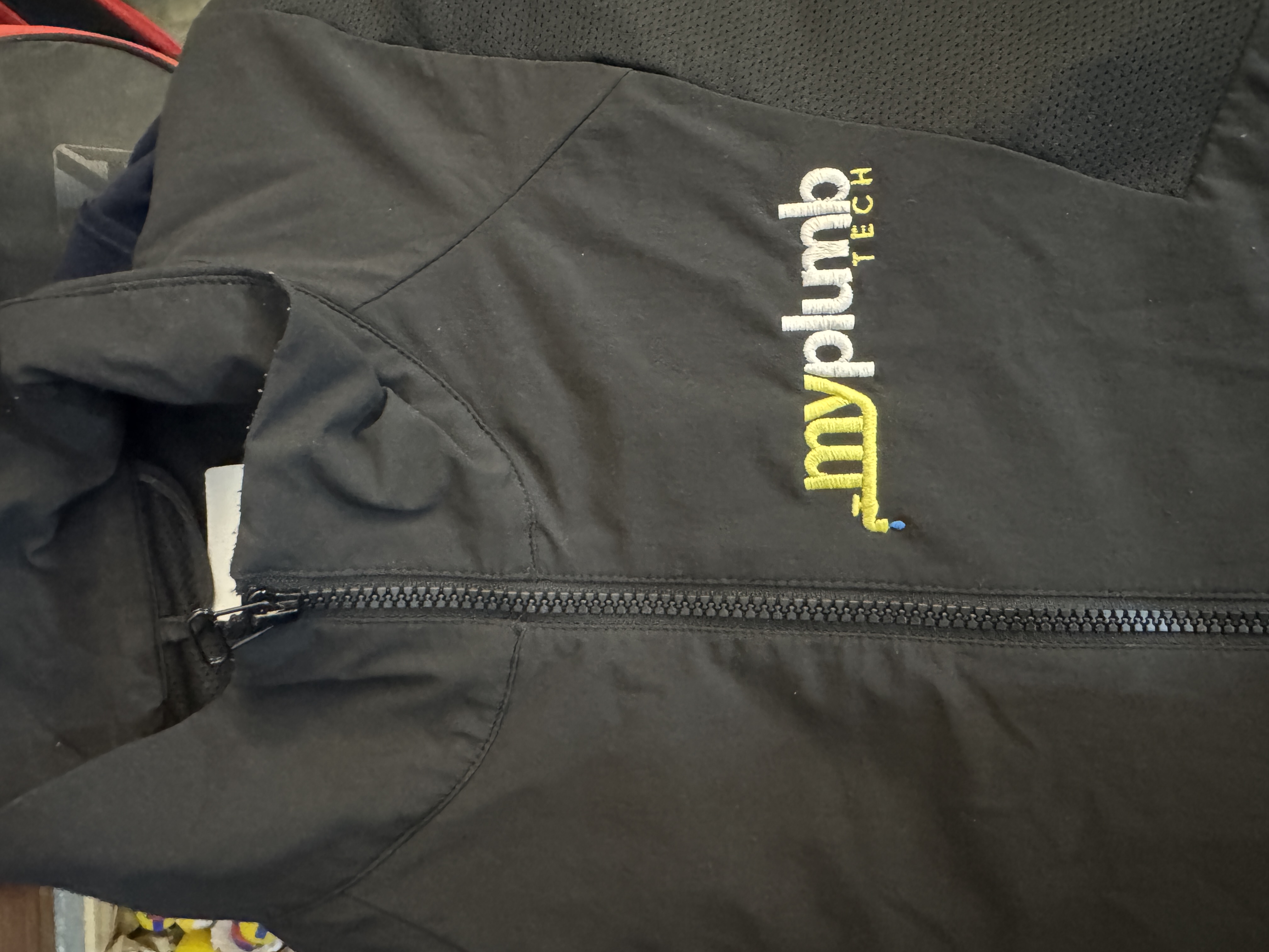 MyPlumb Tech custom embroidery on black jacket
