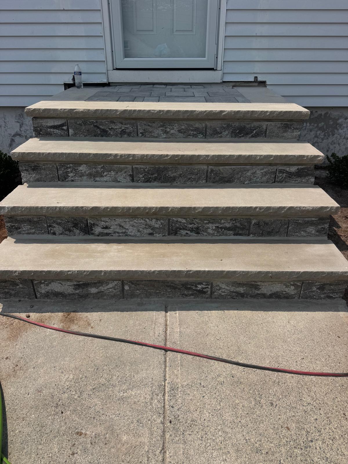 Residential retaining wall by Tames Tree Services Masonry & Landscaping