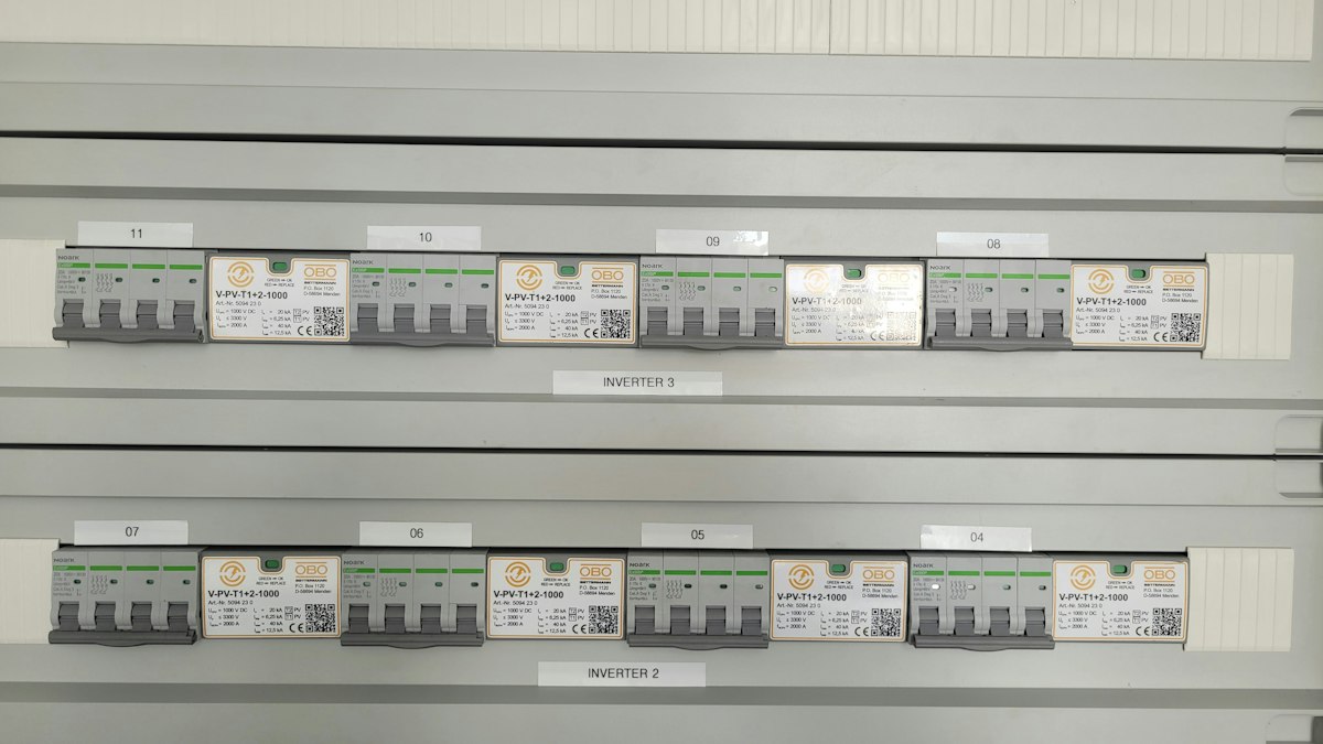 Electrical circuit breakers neatly arranged in two rows