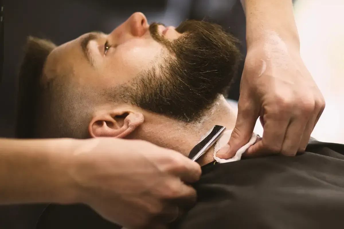 Barber straight razor shave and beard trim
