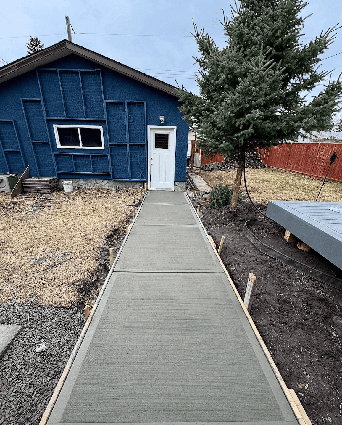 New concrete walkway installation
