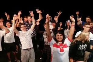 Students participating in a hilarious Vancouver dry grad entertainment hypnosis show