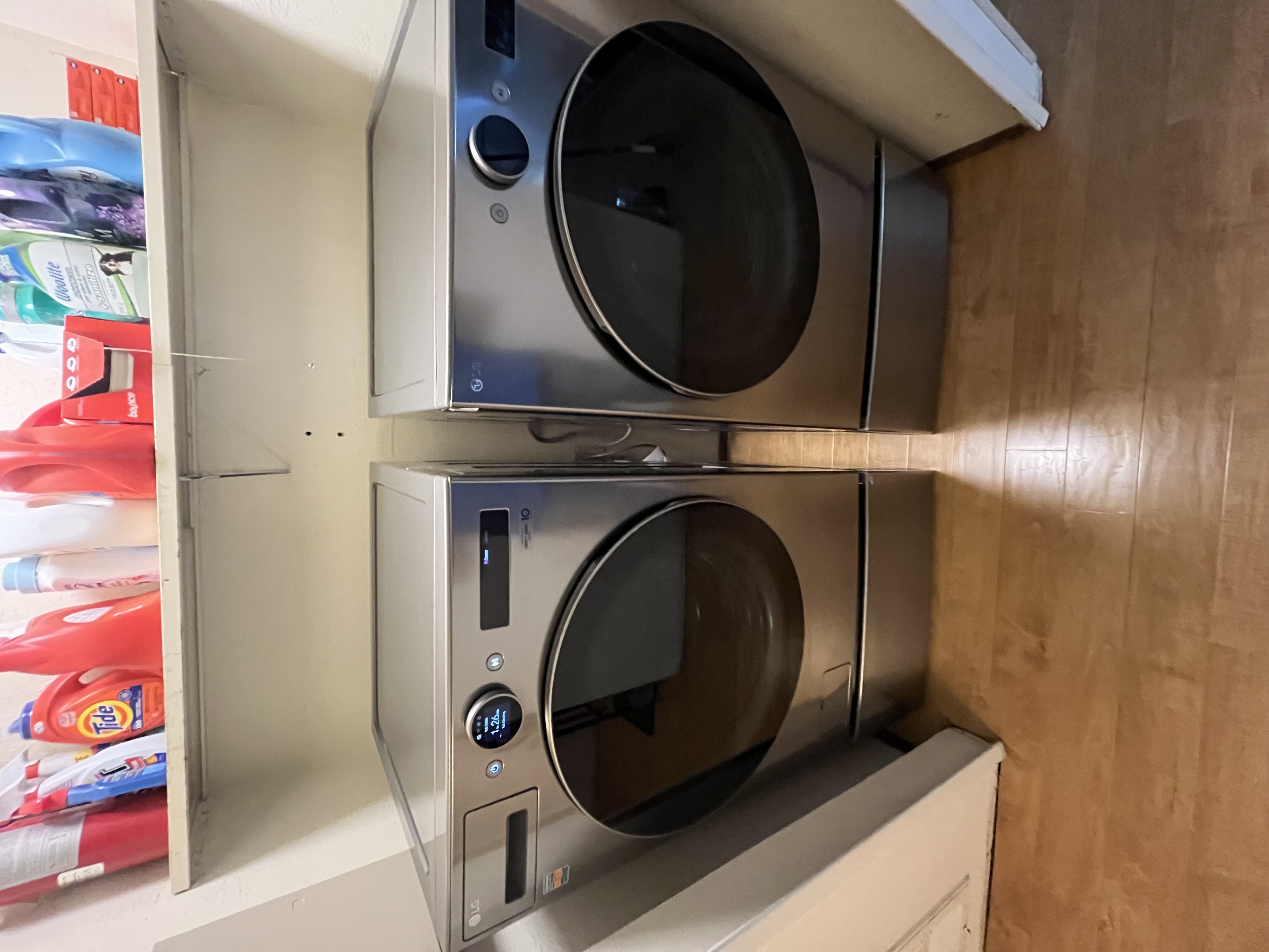 AFTER: New LG front-load washer and dryer installed on pedestals