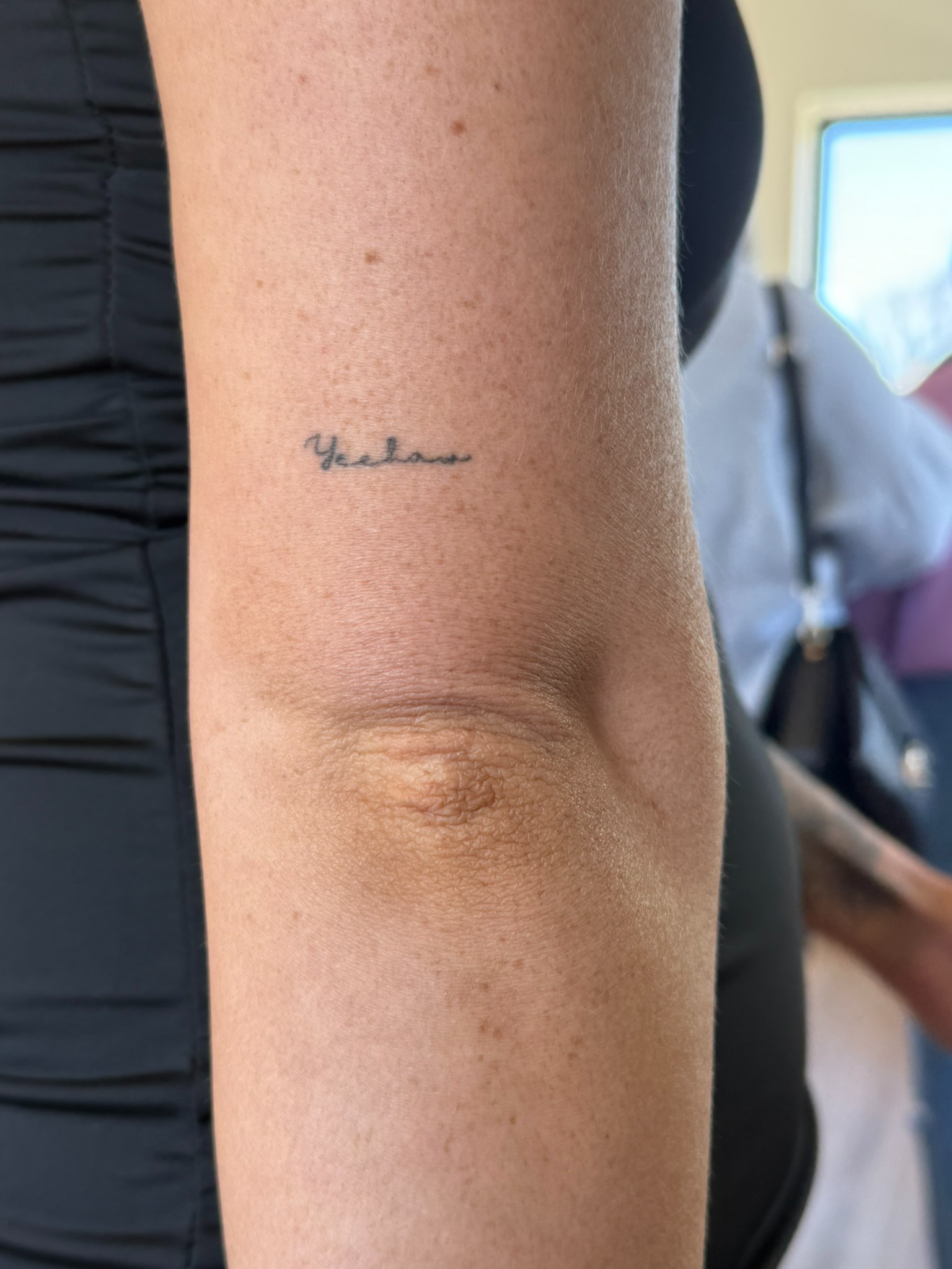 Healed fine line script tattoo Yeehaw