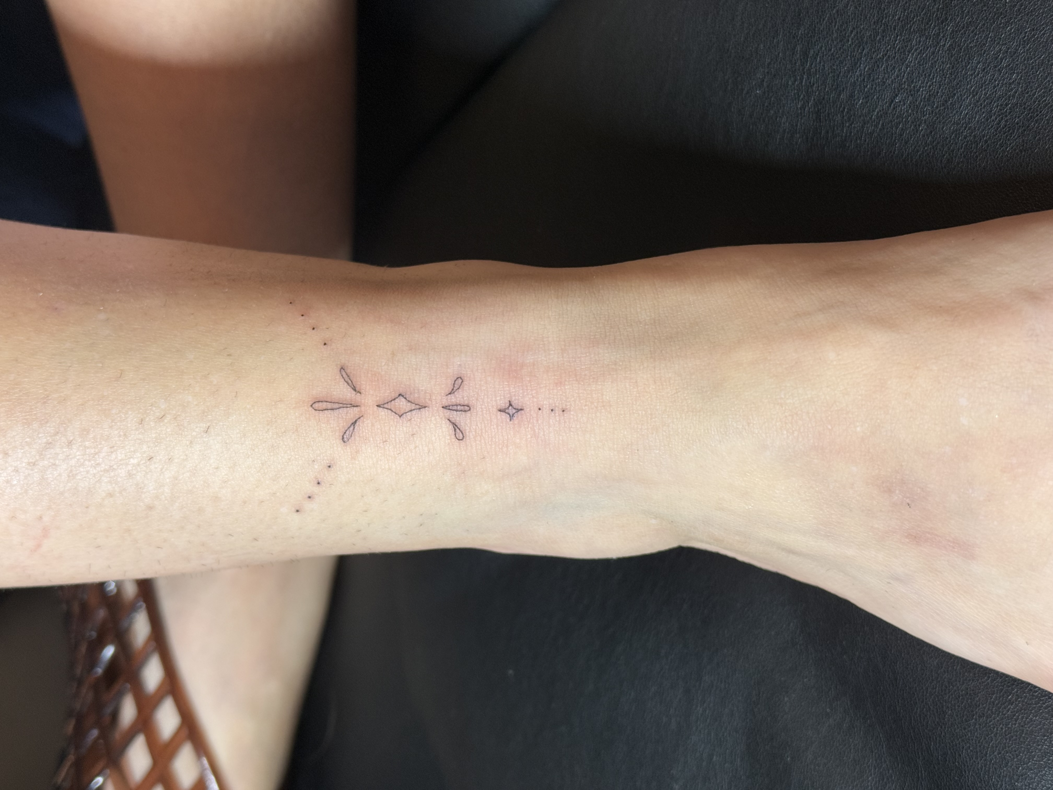 Finished CVR Original Jewelry No. 1 fine line tattoo worn on skin by Clarissa Victoria Rosa in Beavercreek Ohio