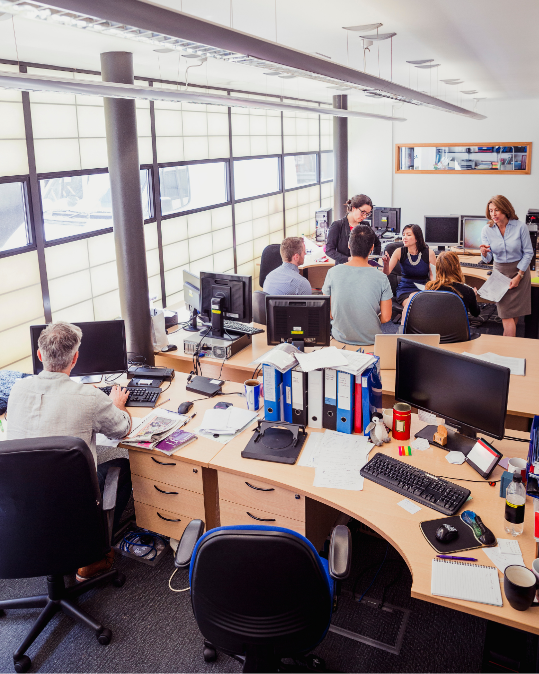 Office environment with employees working