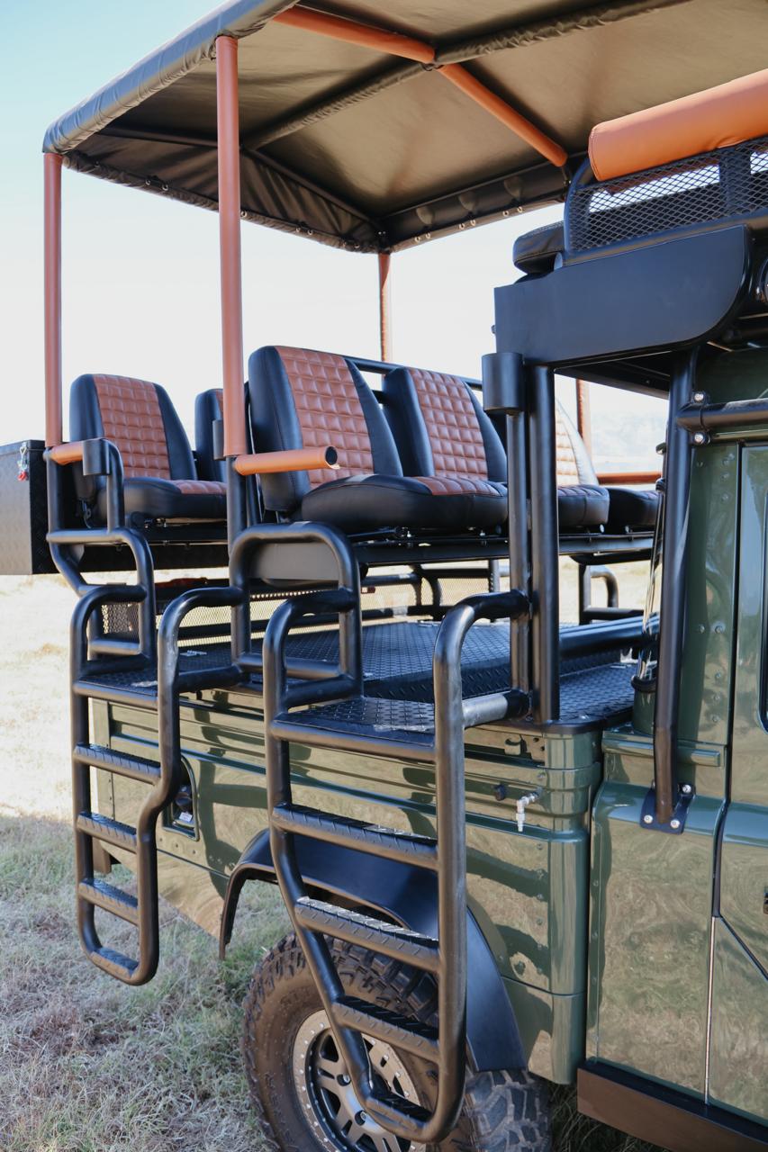 Maverick Defender safari build with elevated seating