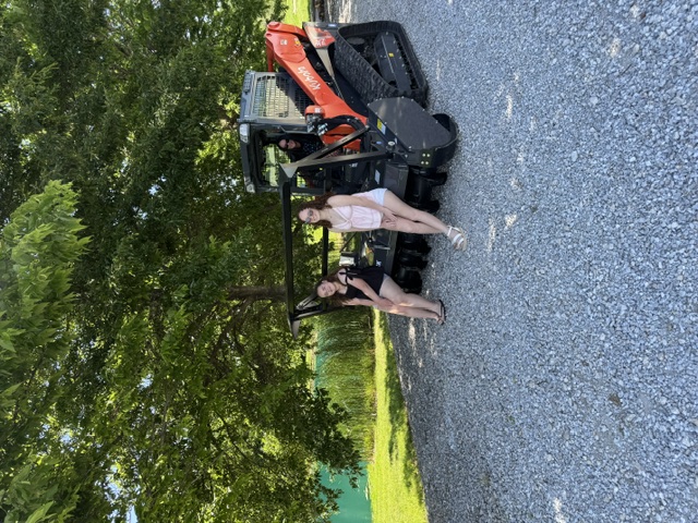 Kubota SVL97 track loader with mulching attachment