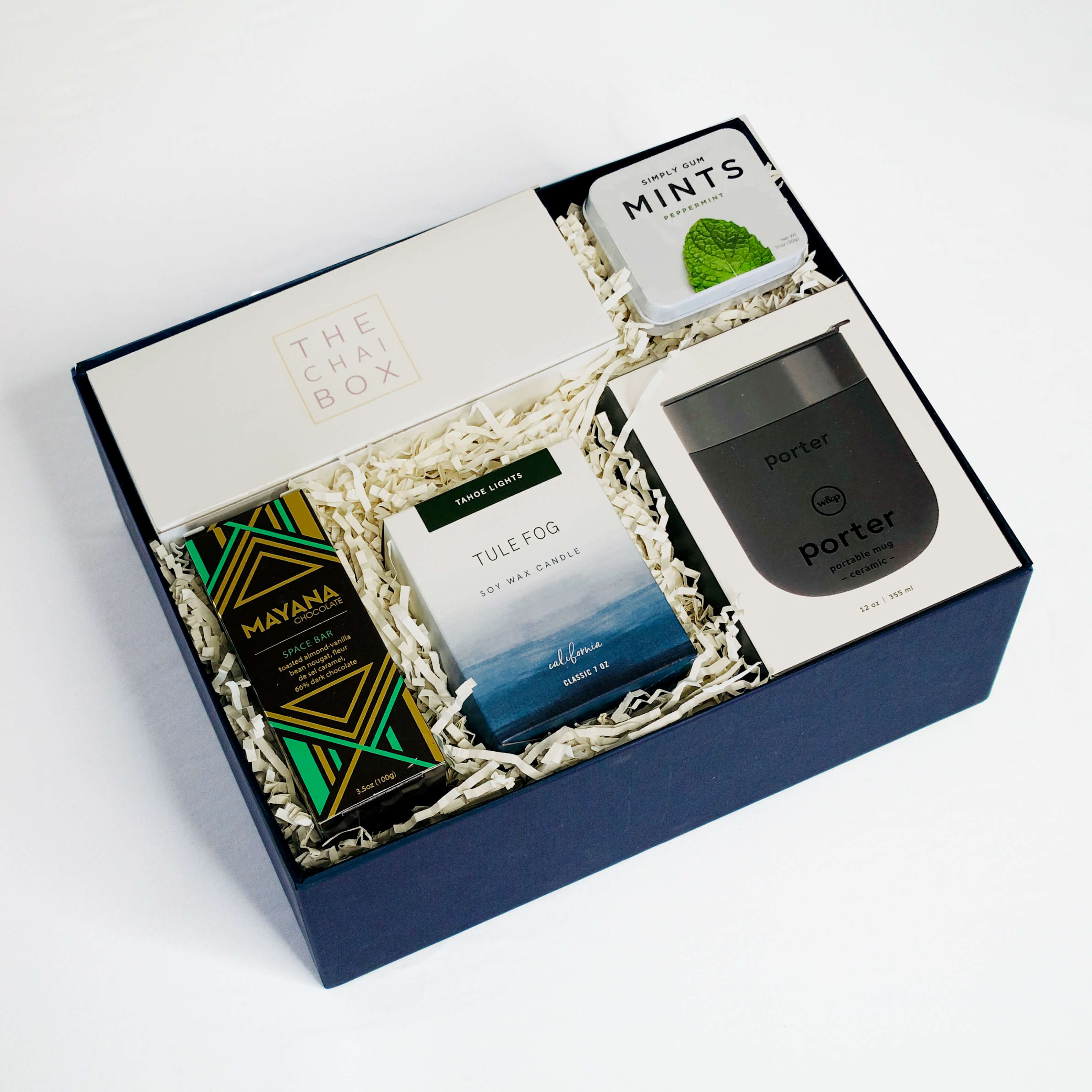 GiftSuite Daily Rituals curated gift box with The Chai Box, W&P Porter mug, Tule Fog candle, and Mayana chocolate