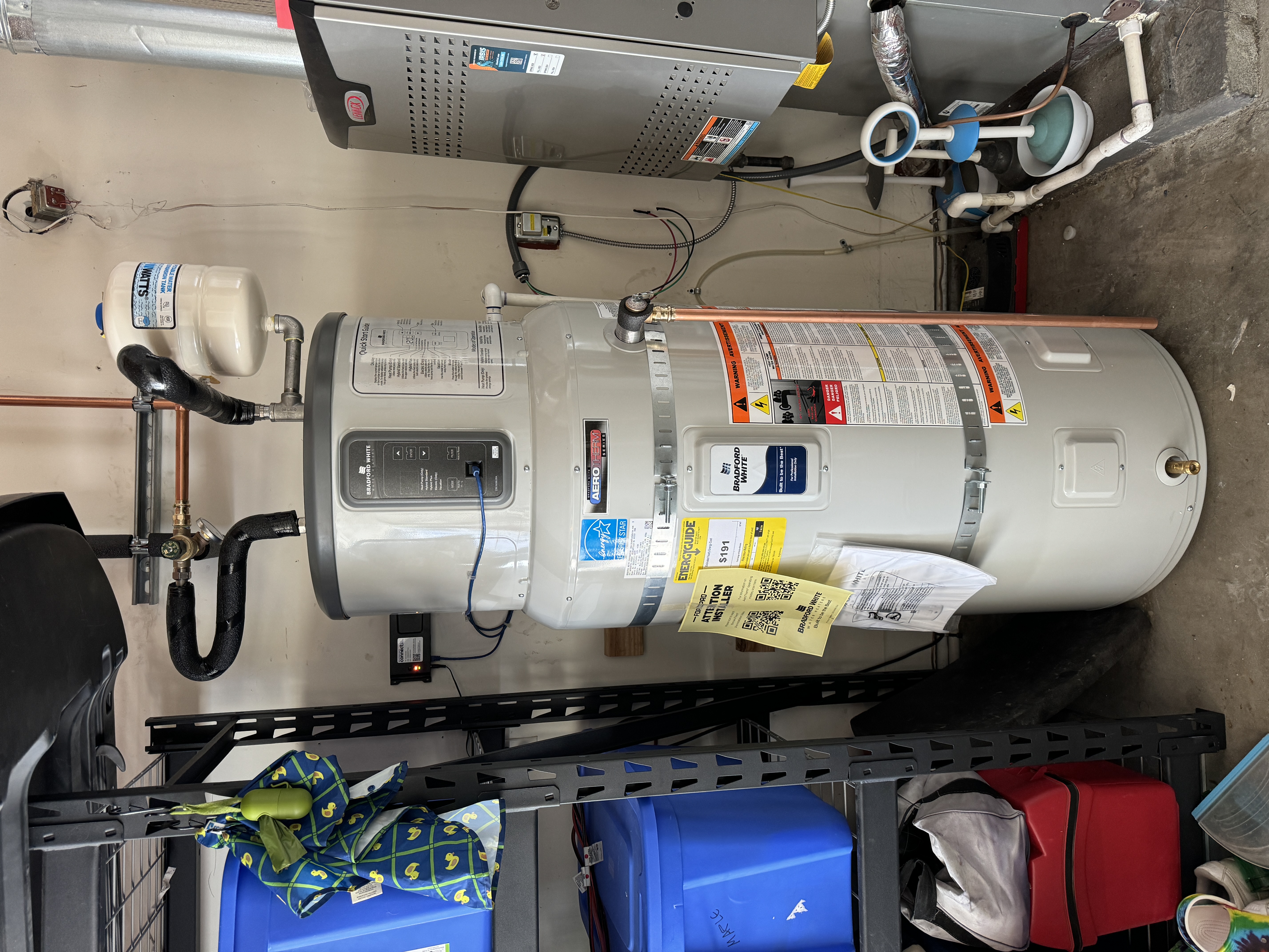 Bradford White AeroTherm Heat Pump Water Heater Next to Furnace