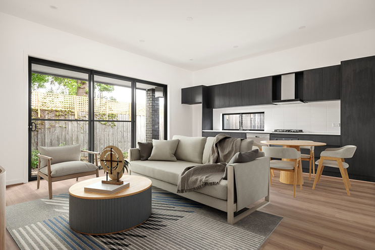 Kitchen and living area virtually staged