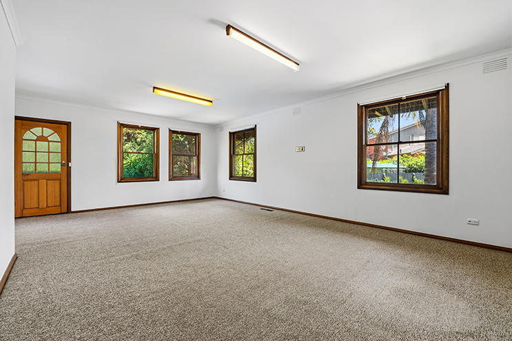 Empty white room before virtual staging